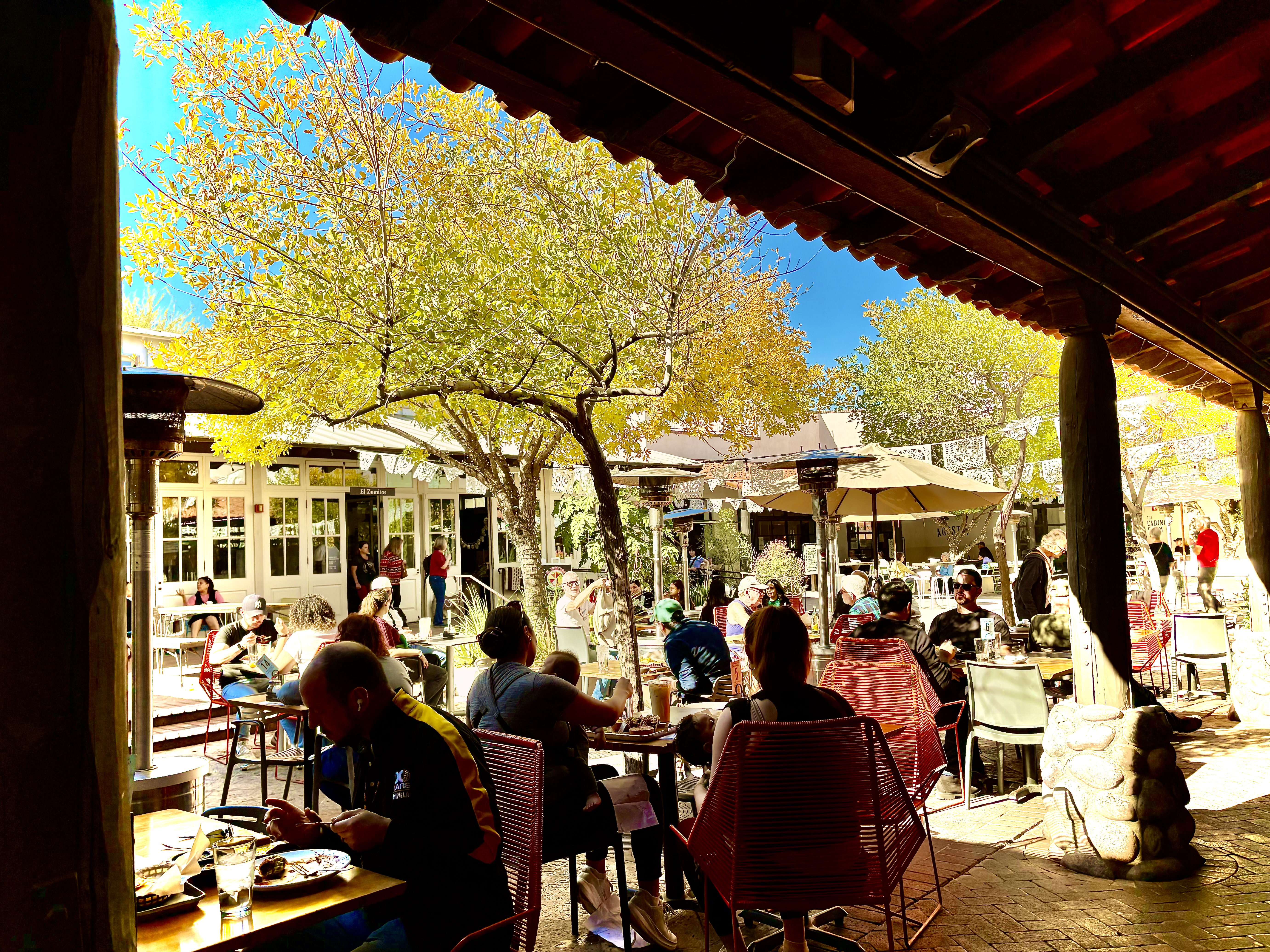A bustling afternoon at Tucson’s Mercado San Agustín, home to Seis Mexican Kitchen and a hub of local flavor and community.